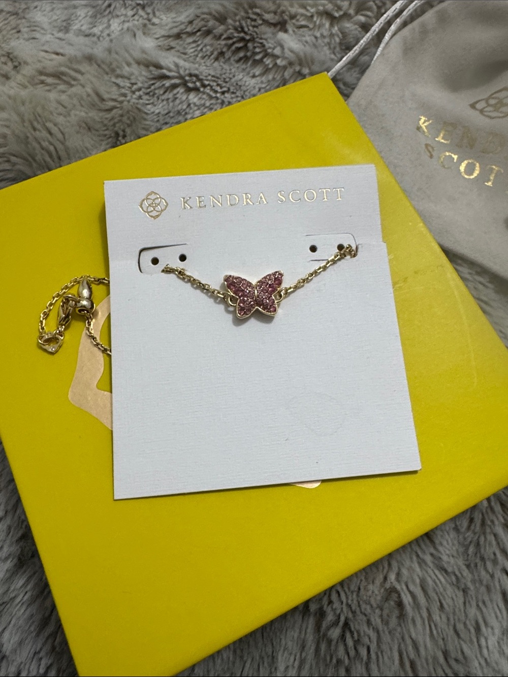 Kendra Scott Gold Bracelet with Pink Crystal Butterfly Charm
